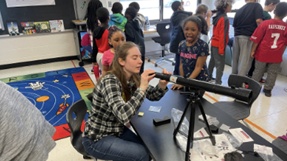Students working with computers in educational setting